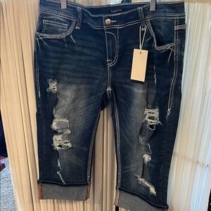 Distressed Blue Boyfriend Jeans with Rolled Hems